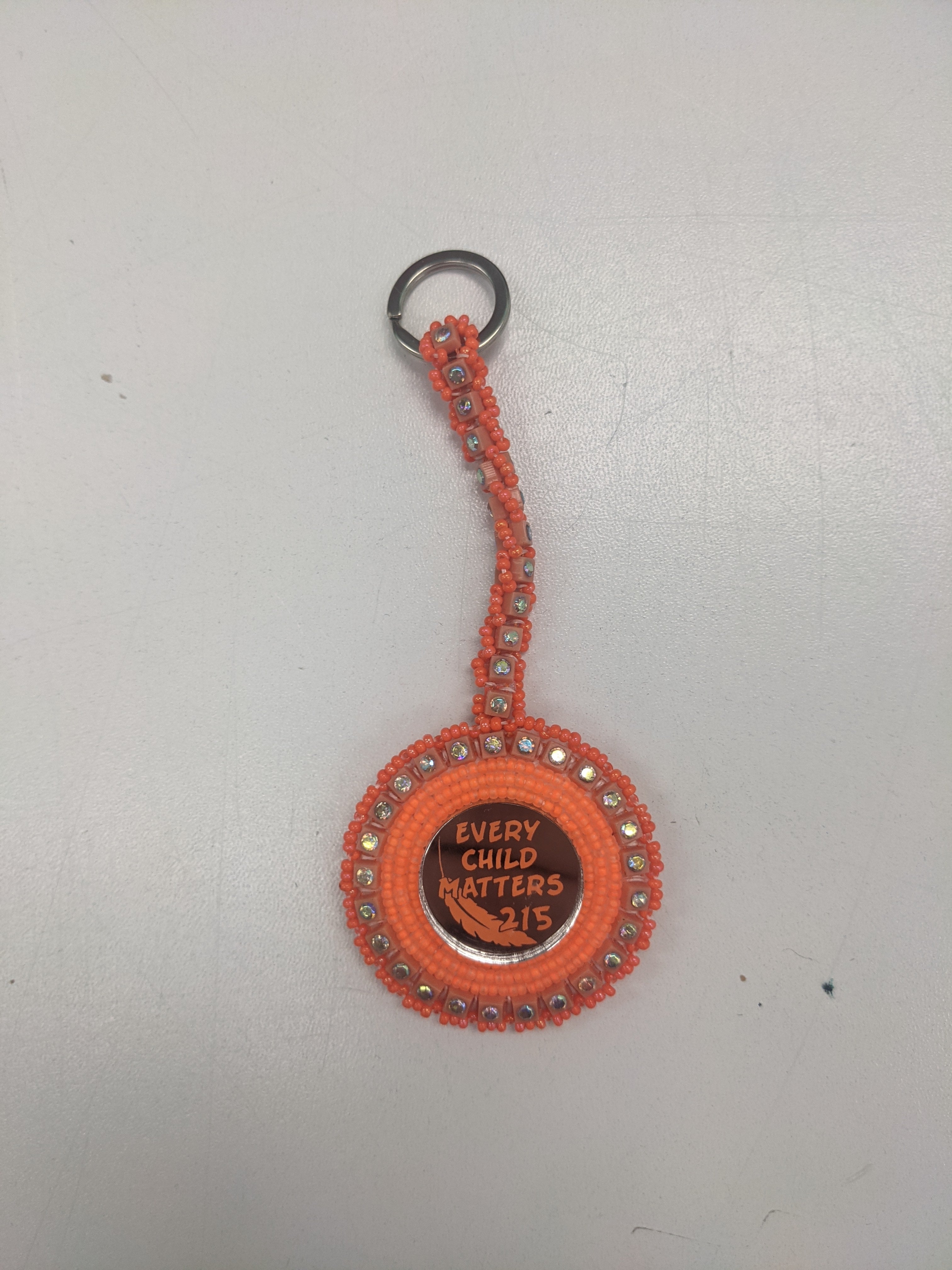 Cheryl Crowchief Beaded Pins and Keychains - Orange Themed